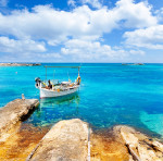 Boot am Strand von Els Pujols - Formentera